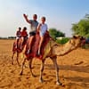 Camel Ride Safari in Red Dunes at Burj Khalifa Tower, Dubai, United Arab Emirates - Image 2