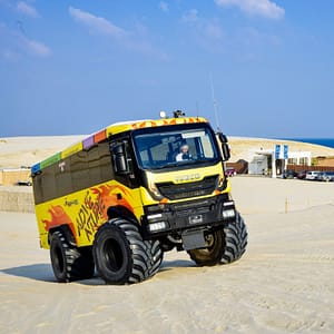 Monster Bus Tour in the Desert with Day Pass at Al Majles Resort Sightseeing and Tours