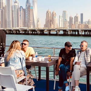 Embark On Dubais Starlit Marina Sunset/Diner Cruise For 4 People Dubai