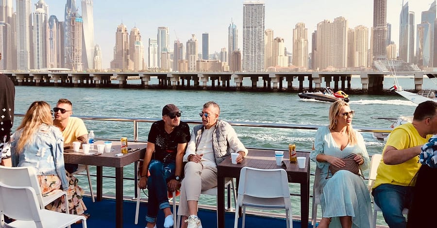 Embark On Dubais Starlit Marina Sunset/Diner Cruise For 4 People Dubai